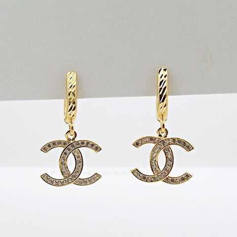 Chanel Paris Spring 1993 Long Gold Plated CC Logo Earrings